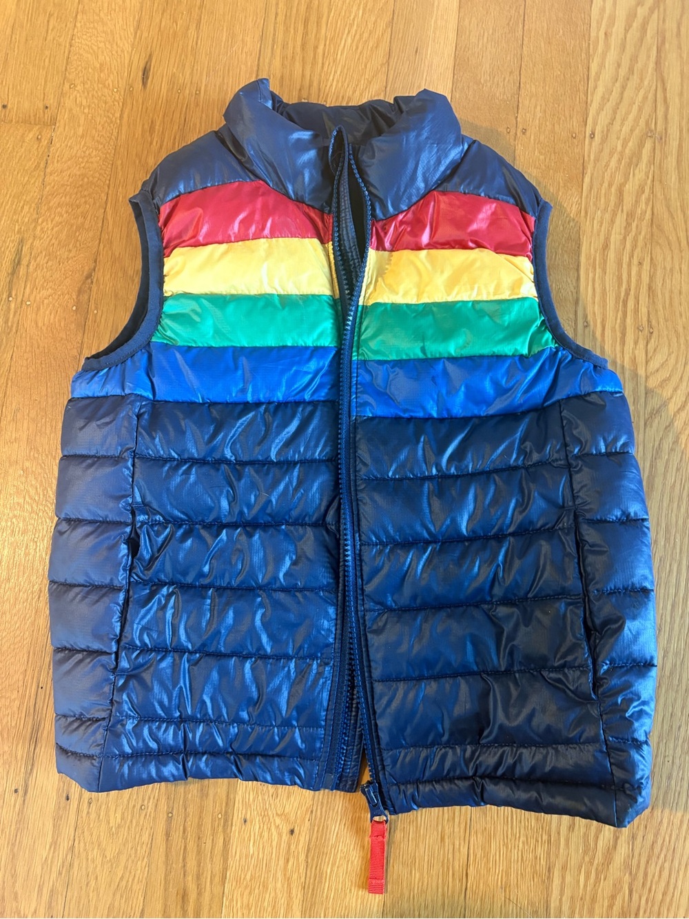 Primary rainbow stripe puffer vest